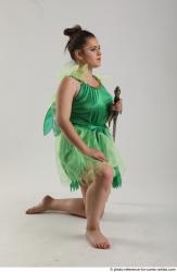 KATERINA KNNELING POSE WITH SWORD